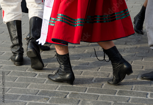 Female dancer in red skirt at Main Square, Krakow