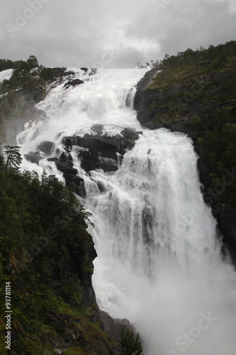 Waterfall in Husedalen valley in Hardangervidda national park, Norway