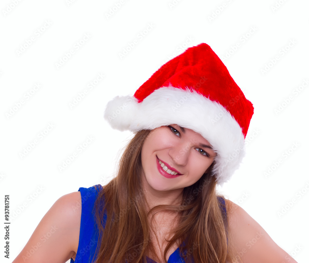 Expressive emotional girl in a Christmas hat on white background Expressive emotional girl in a Christmas hat on white background