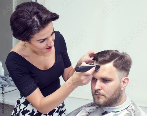 The young man at the hairdresser salon hairstyle make model