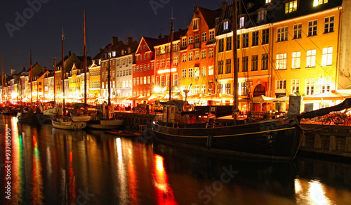 Boats at the Nyhavn harbor in night, Copenhagen, Denmark