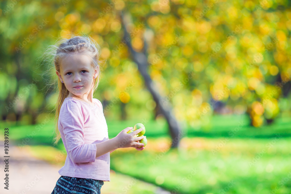 Adorable little girl outdoors at beautiful autumn day Adorable little girl outdoors at beautiful autumn day