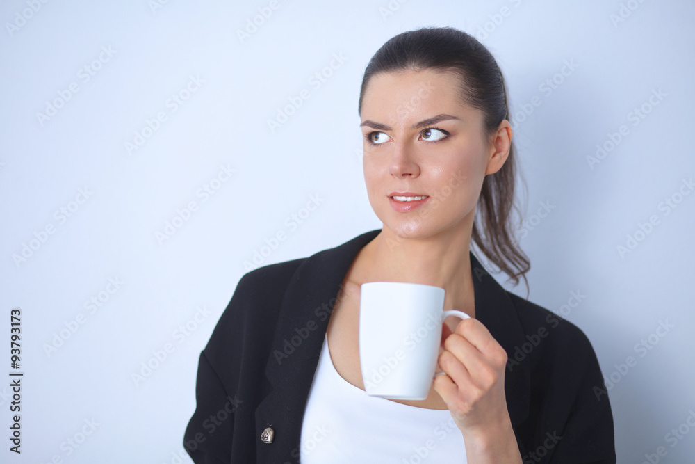 Young woman holding a mug, isolated on white background Young woman holding a mug, isolated on white background