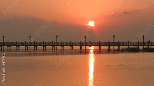 Sunset fishing pier seagulls orange Texas HD photo