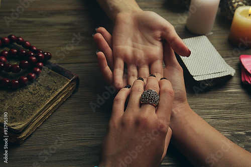 Witch - fortune teller reading fortune close up