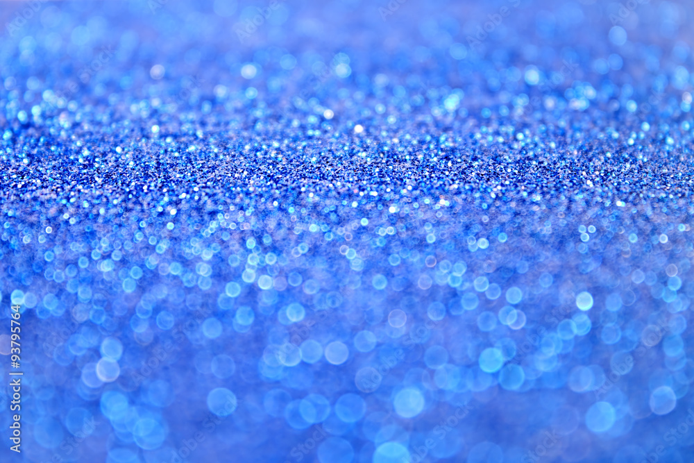Blue glitter confetti background for Christmas or New Year's Eve Blue glitter confetti background for Christmas or New Year's Eve