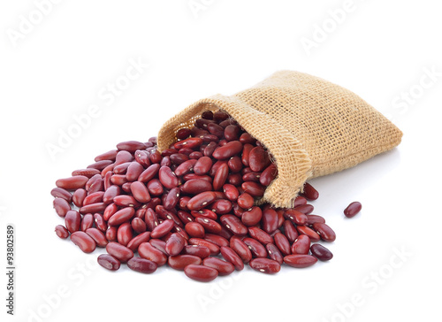 red beans in the sack isolated on white background © kitsananan Kuna