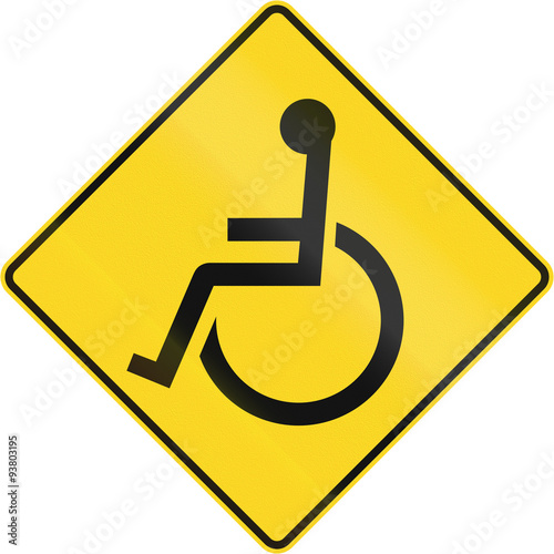 Warning road sign in Canada - Disabled. This sign is used in Quebec