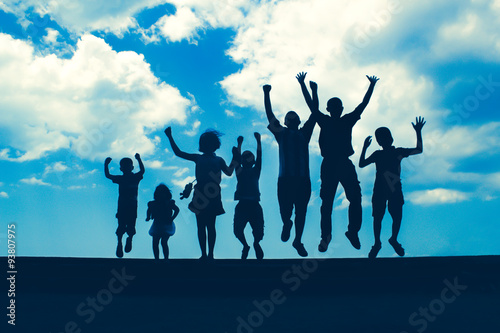 seven happy children jumping