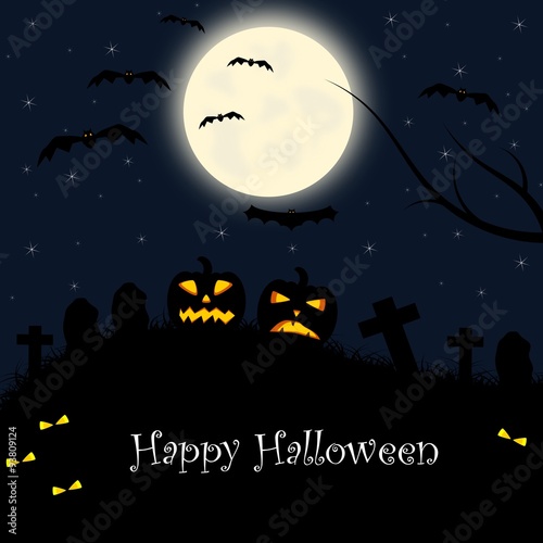 Halloween pumpkins and bats in the cemetery