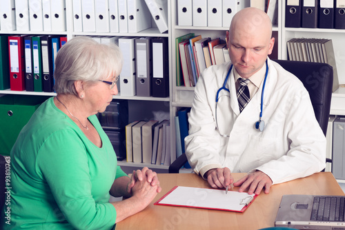 doctor in interview with a a female senior