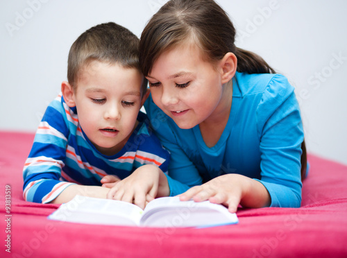 Children is reading book