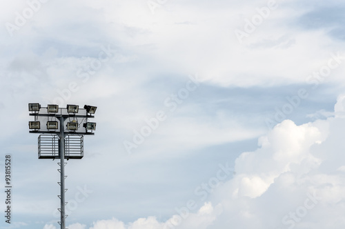 Stadium spotlight and sky in the noon