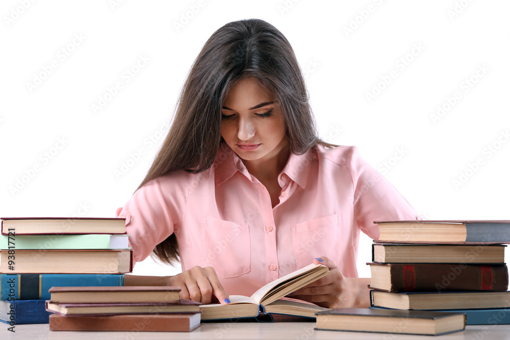 Young girl reading book isolated on white Young girl reading book isolated on white