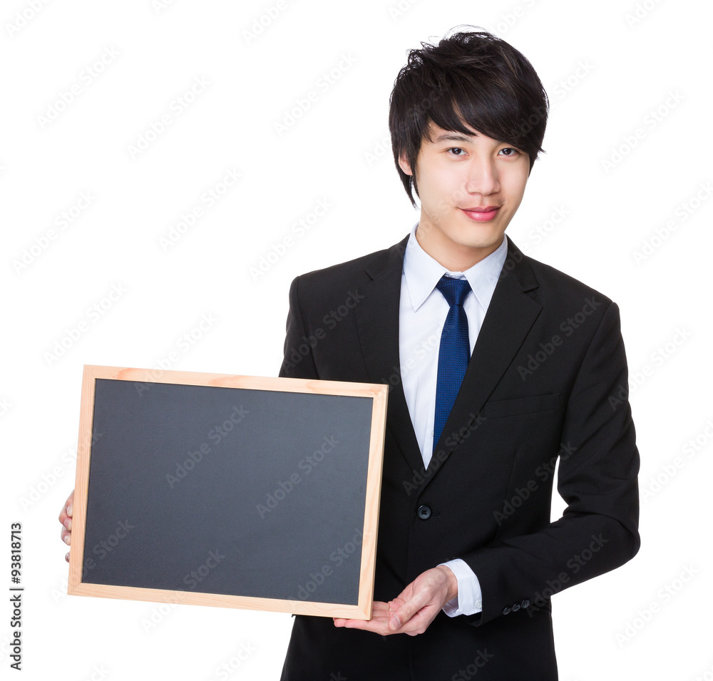 Asian Young businessman show with the chalkboard Asian Young businessman show with the chalkboard
