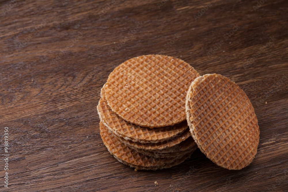 Waffles with caramel on wood Waffles with caramel on wood