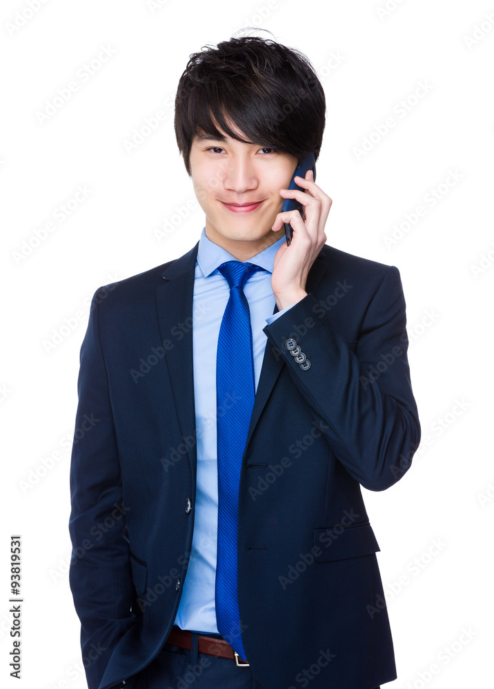 Young Businessman chat on mobilephone Young Businessman chat on mobilephone