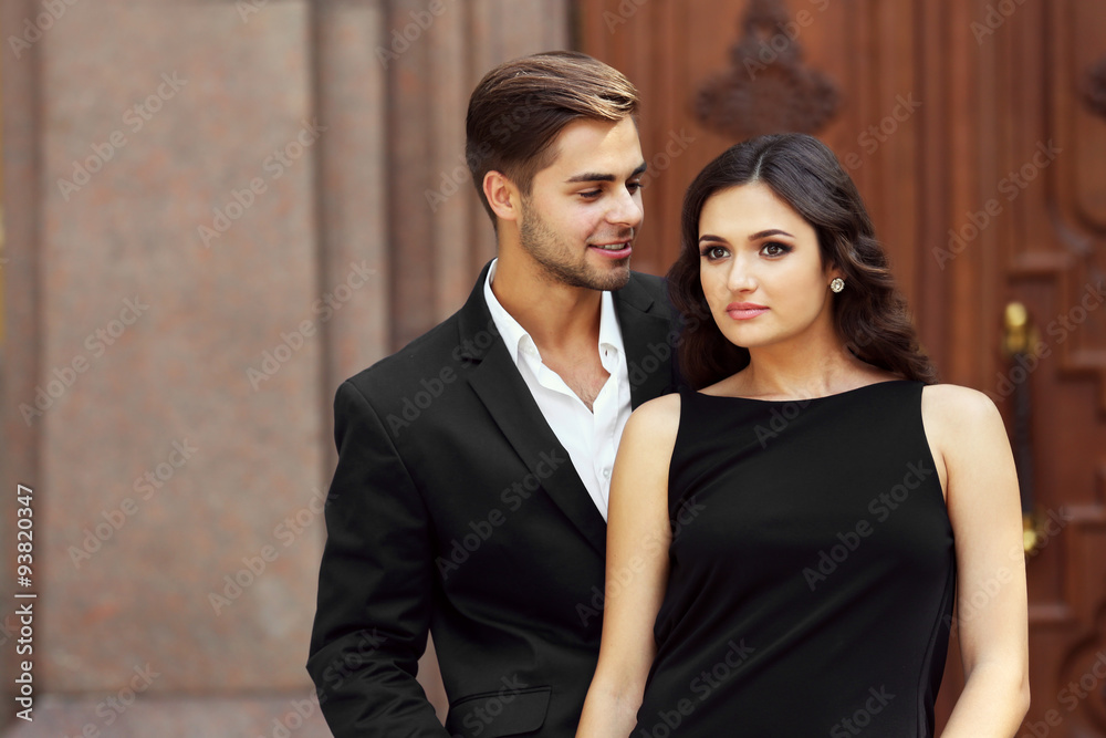 Elegant couple pose outdoors Elegant couple pose outdoors