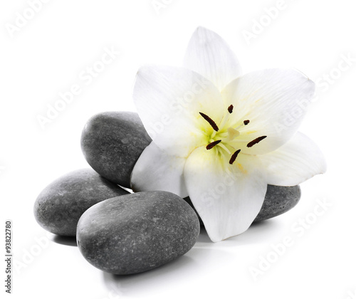 Fototapeta Naklejka Na Ścianę i Meble -  Lily and spa stones isolated on white