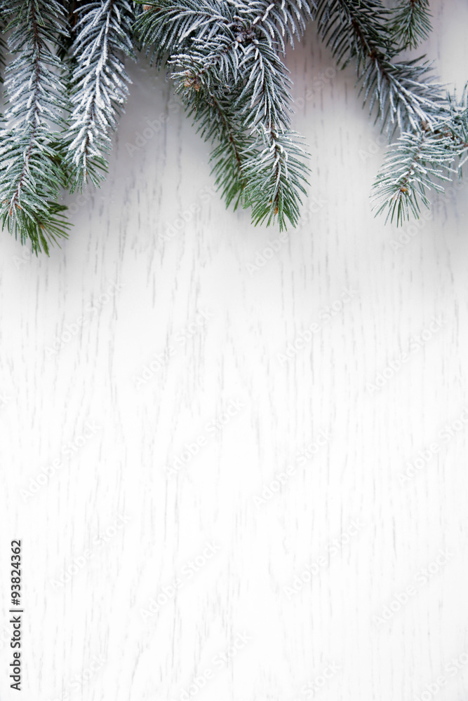 Christmas tree with frost on old wooden table Christmas tree with frost on old wooden table