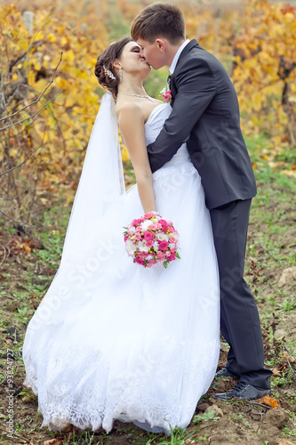 Happy new married in autumn forest
