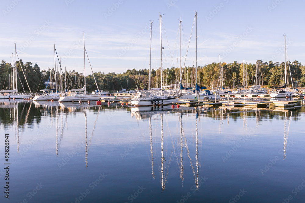 Sail Boats on a beautiful cloudless morning in a Swedisch harbou