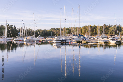 Sail Boats on a beautiful cloudless morning in a Swedisch harbou