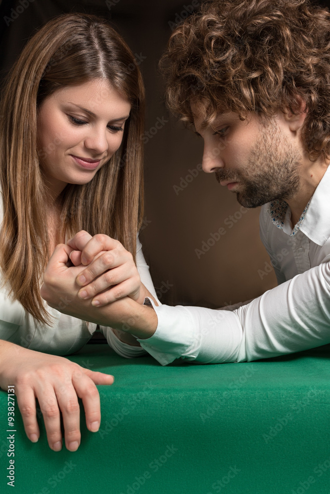 woman beats man to challenge of arm wrestling Stock Photo | Adobe Stock