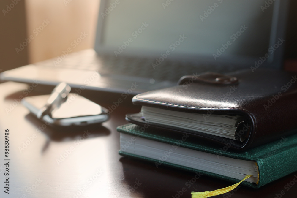 office desk with a computer and a telephone diary office desk with a computer and a telephone diary