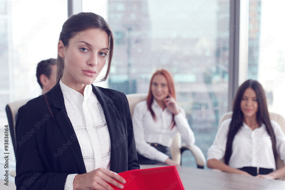 Portrait of business woman and team Portrait of business woman and team
