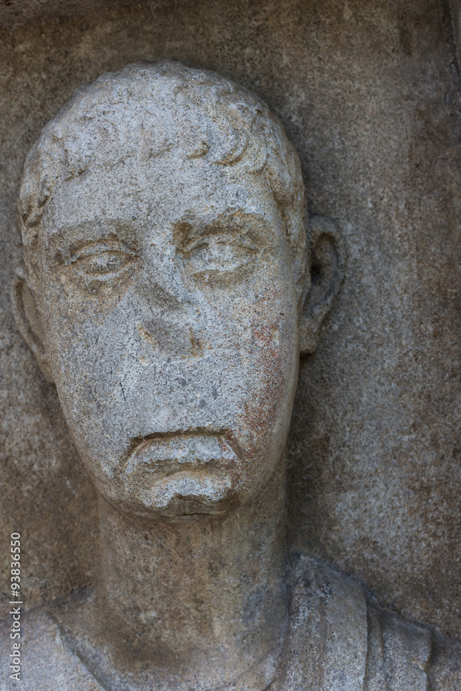 relief of man on the 14th century Romanesque-Gothic Cathedral of Trieste, Italy relief of man on the 14th century Romanesque-Gothic Cathedral of Trieste, Italy