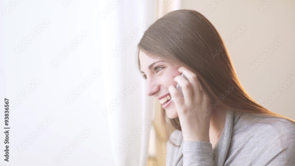 Beautiful woman talking on mobile phone. She's happy Beautiful woman talking on mobile phone. She's happy