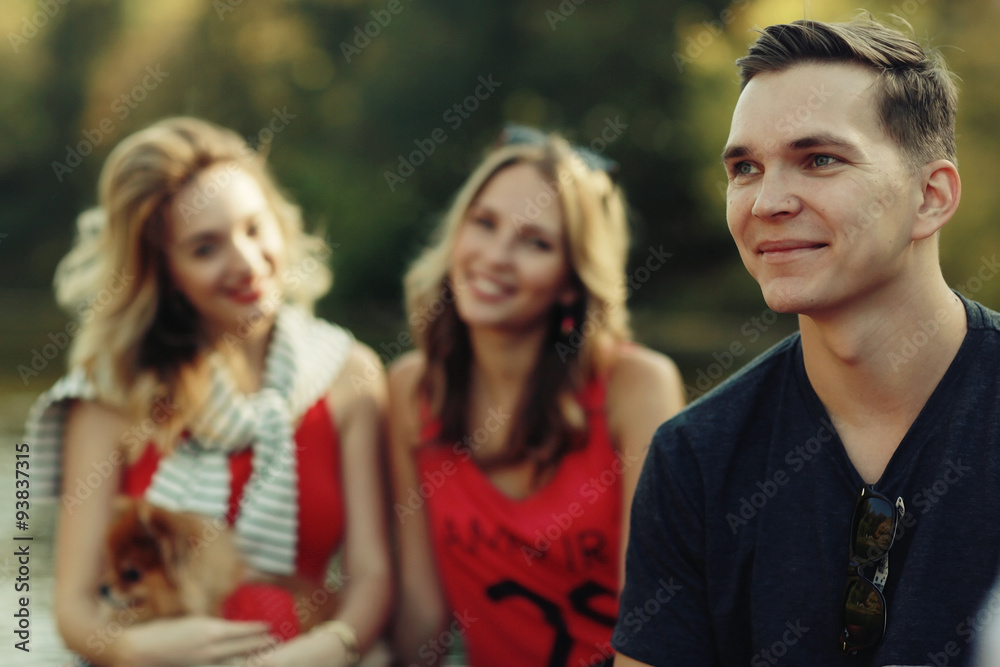 young people in autumn park in Europe