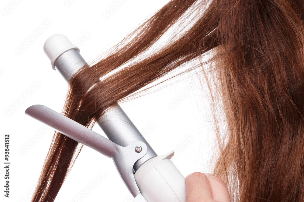 Fototapeta premium Curling iron and hair