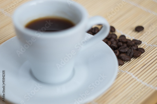 warm cup of ciffee on brown background