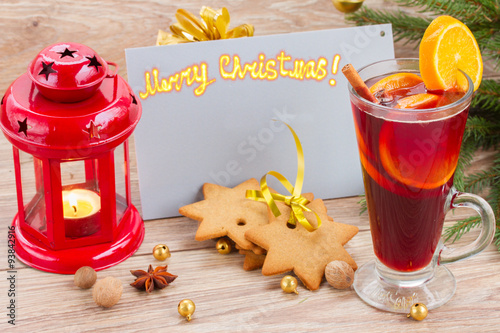 mulled wine with decorated christmas tree photo