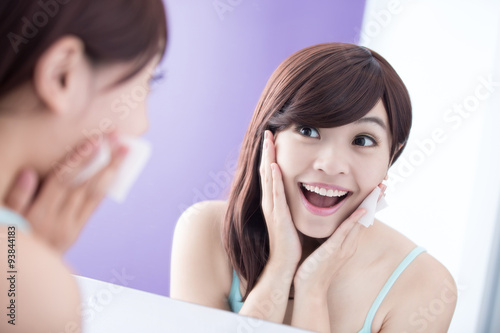 Smile woman remove makeup