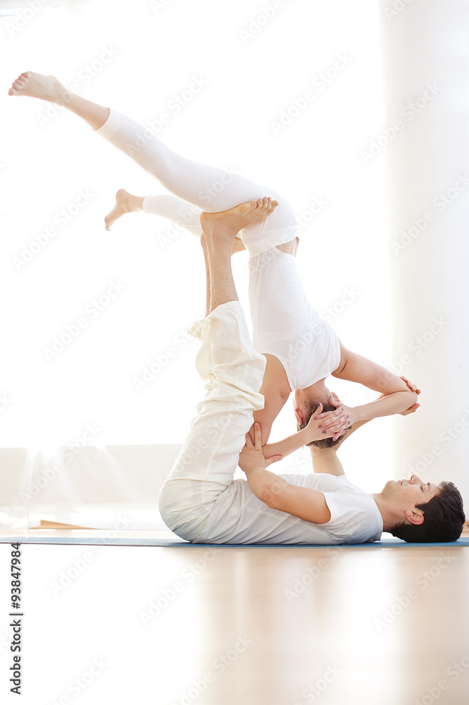 Fototapeta premium two people in yoga studio 
