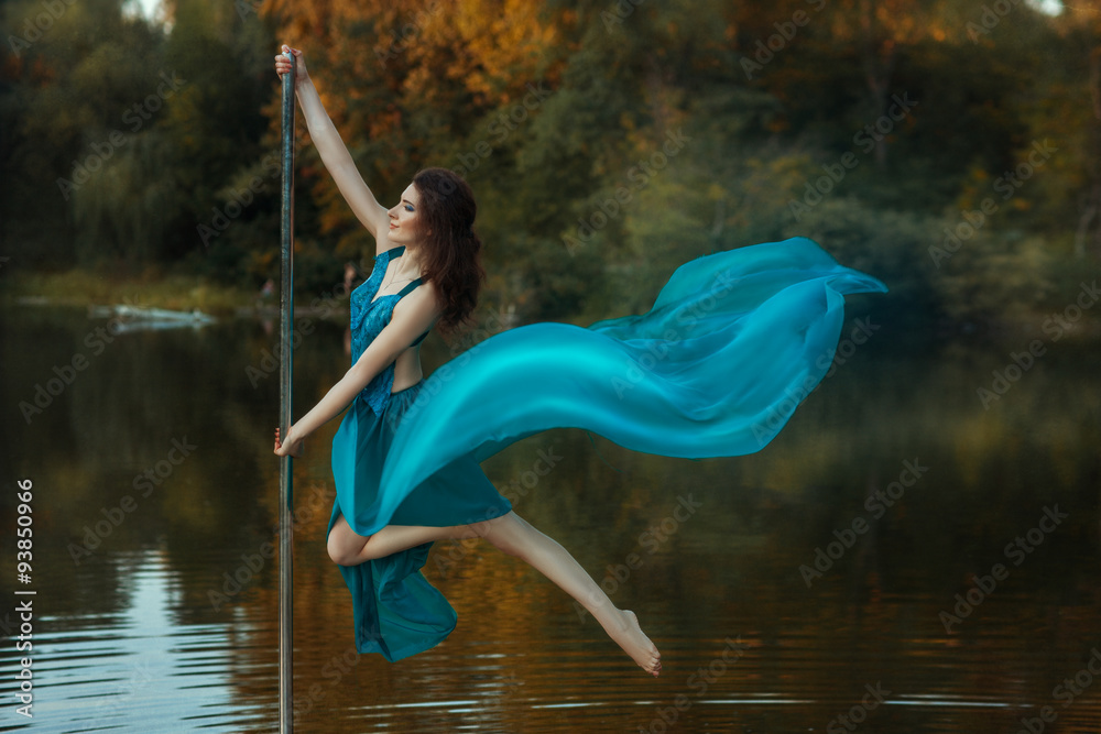 Girl flying dance, and her dress developing the wind. Girl flying dance, and her dress developing the wind.