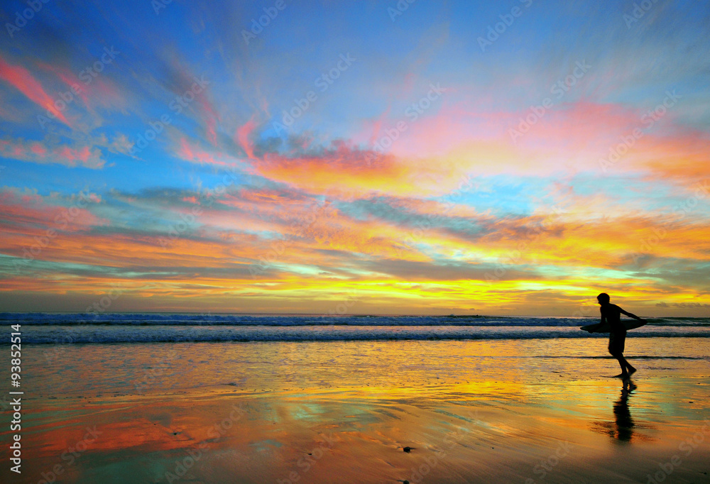 Surfing on amazing sunset, Portugal Surfing on amazing sunset, Portugal