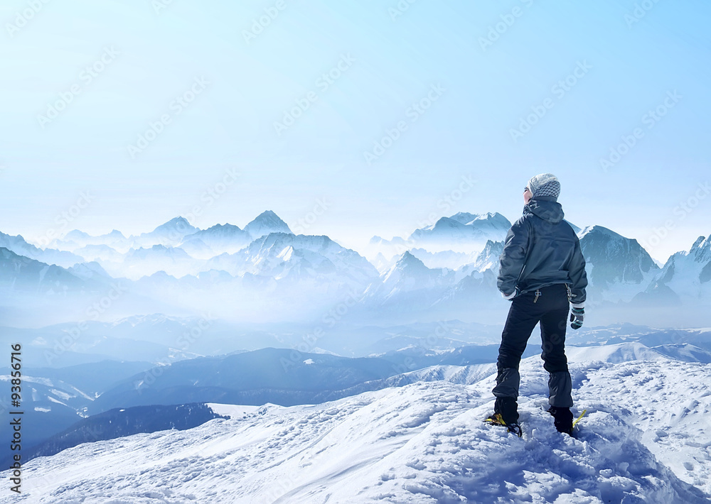 Silhouette of a champion on mountain peak. Active life concept
