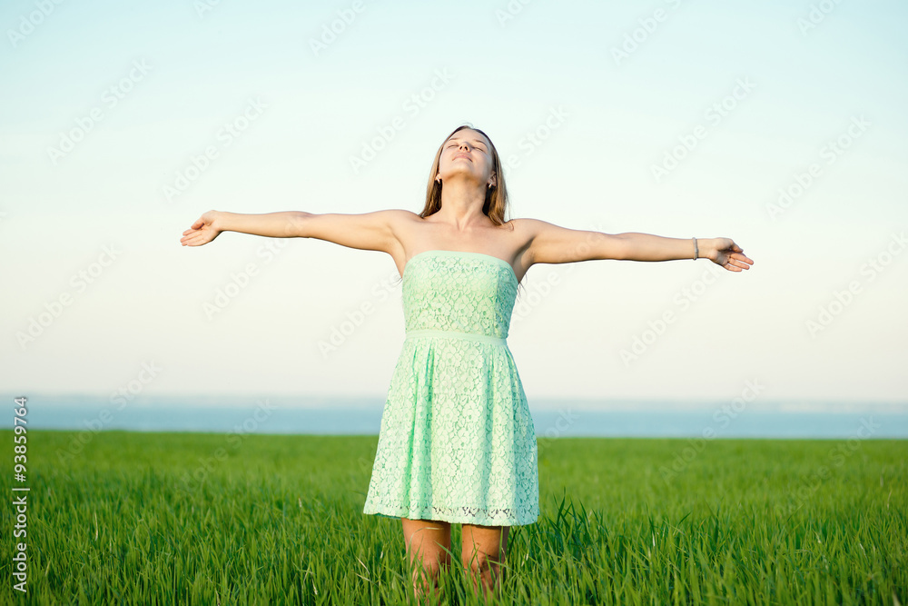 Happiness woman stay outdoor under sunlight of sunset Happiness woman stay outdoor under sunlight of sunset