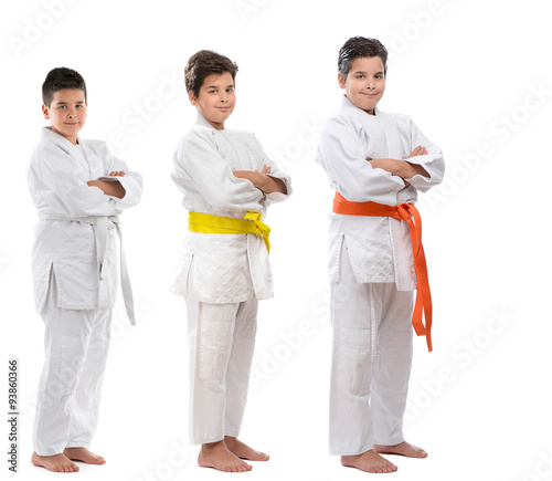 Judo kid starting from white belt to orange belt sequence.