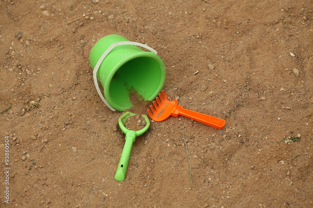 Children's bucket and shovel in the sandbox Children's bucket and shovel in the sandbox