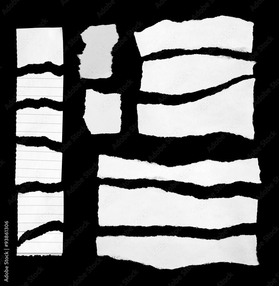 Torn white papers on black Torn white papers on black