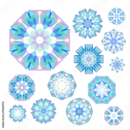 Set of blue polygonal snowflakes on white, in vector