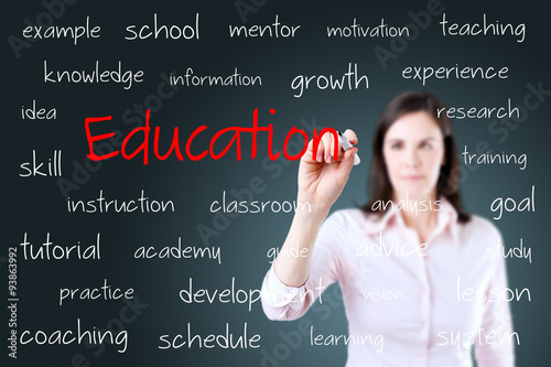 Young business woman writing education concept