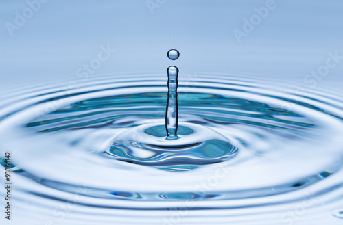 Blue water drop falling
