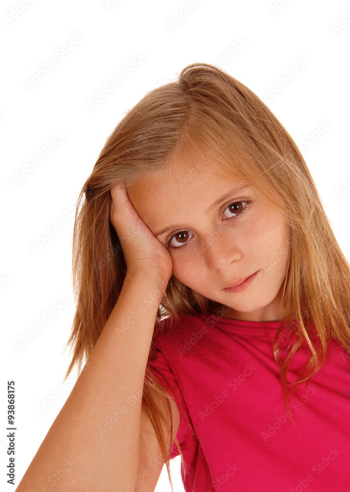 Pretty blond girl with her hand on head. Pretty blond girl with her hand on head.