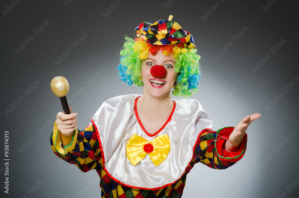 Clown with mic in funny concept Clown with mic in funny concept